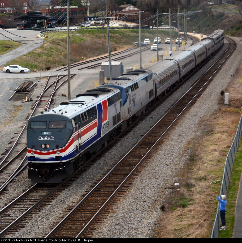 Amtrak #20 leaves Lynchburg and gets an enthusiastic wave from a trail walker